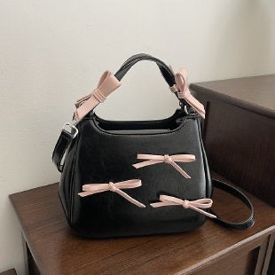 Bow bucket bag